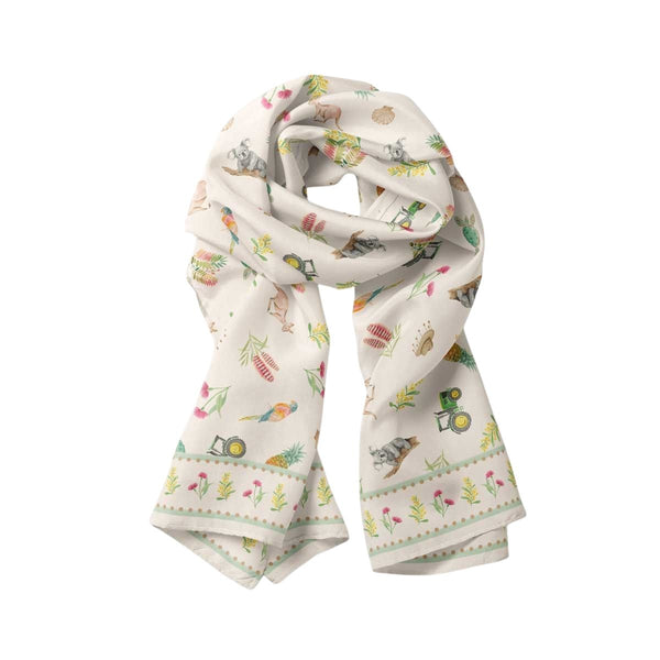 Loving Our Sunburnt Country Modal Long Scarf by Cass Deller, a cream scarf with a country Australian print, loosely draped